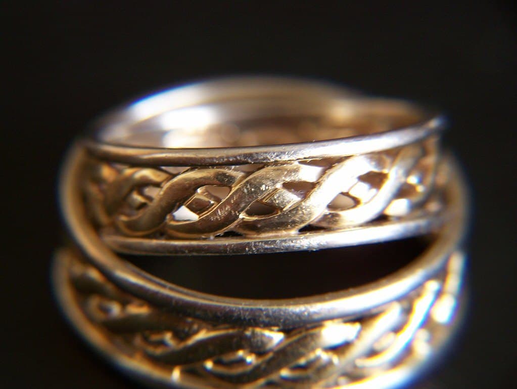 Celtic braid band — yellow gold