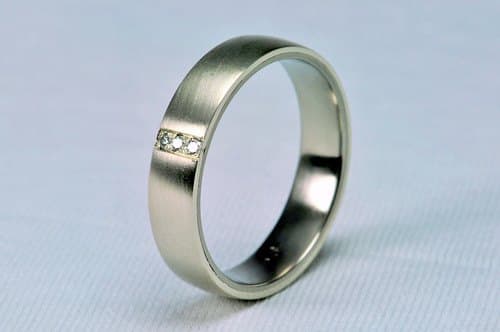 Men's wedding band — three diamonds