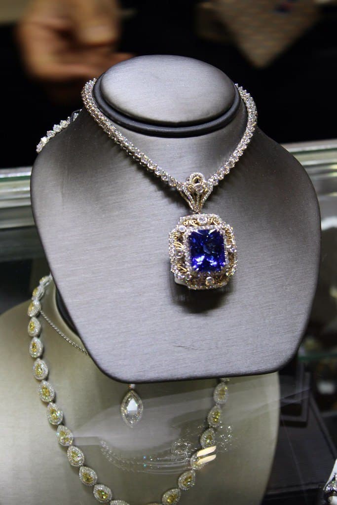 Sapphire halo pendant — cushion cut