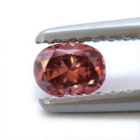 Lab-grown fancy orange oval 1.10 ct — IGI
