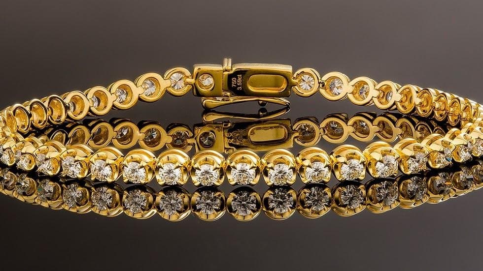 Gold bezel tennis bracelet — 18k