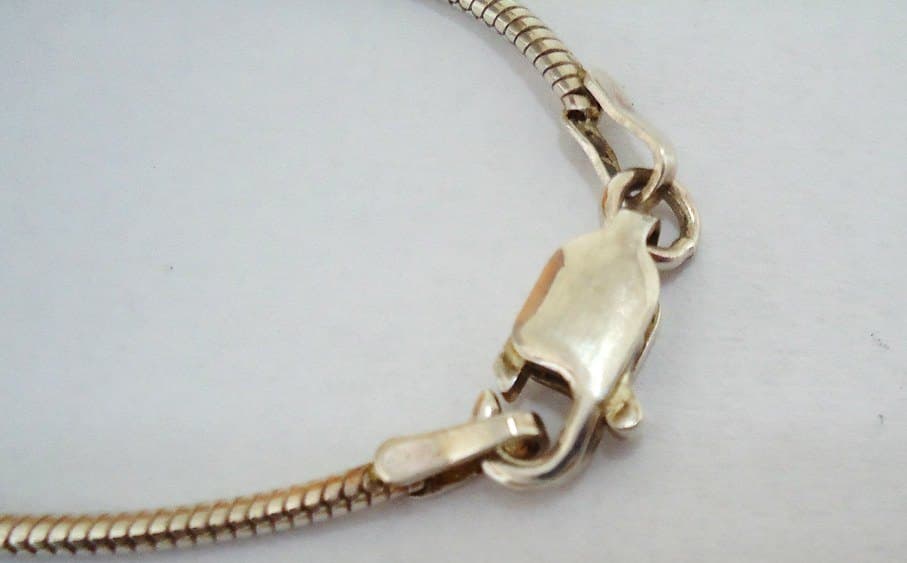 Snake chain bracelet — sterling & gold clasp